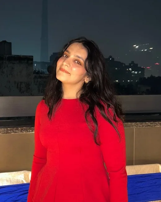 Nandini Sethi, photographed on a rooftop in Delhi at night.